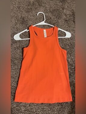 orange ish pink Lulu tank size 4!